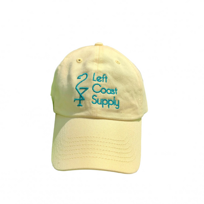 Yellow hat with Left Coast Supply logo.