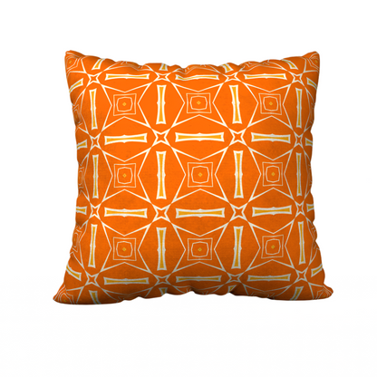 Orange pillow case with a vintage tiki print.
