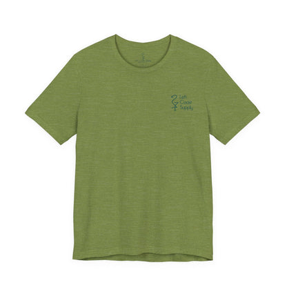 Green t-shirt with a skull design made of leaves on the back. Left Coast Supply