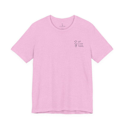 Pink t-shirt with a black flamingo graphic on the back left coast supply