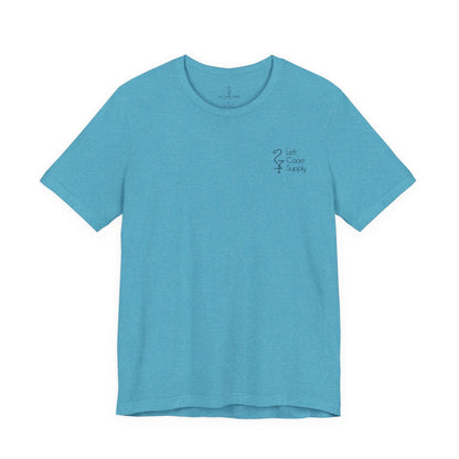 Blue t-shirt with a black flamingo design on the back Left Coast Supply