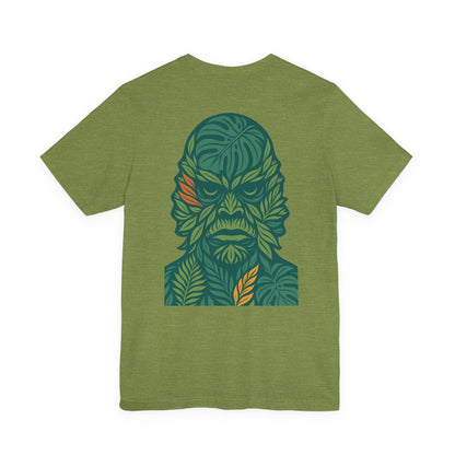 Green t-shirt with a leaf-patterned creature graphic on the back. Left Coast Supply