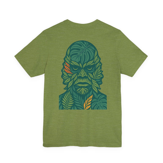 Green t-shirt with a leaf-patterned creature graphic on the back. Left Coast Supply