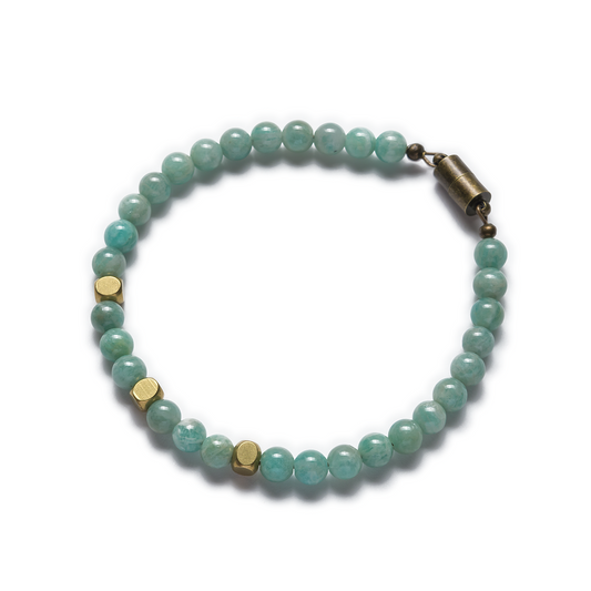 A bracelet with round amazonite beads and raw brass accents, featuring an antique-colored brass magnetic clasp. Left Coast Supply