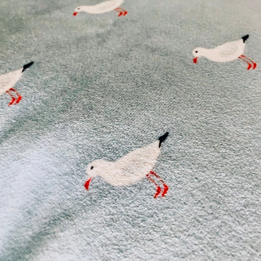 Light blue pillow case with seagulls. Left Coast Supply