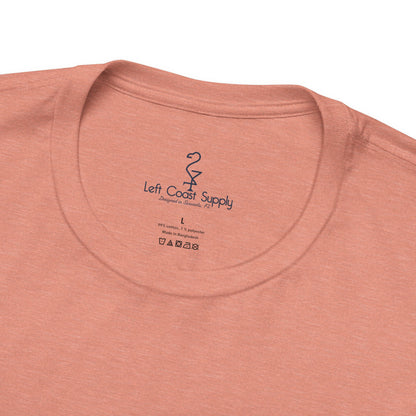 Orange t-shirt with a black flamingo design on the back Left Coast Supply