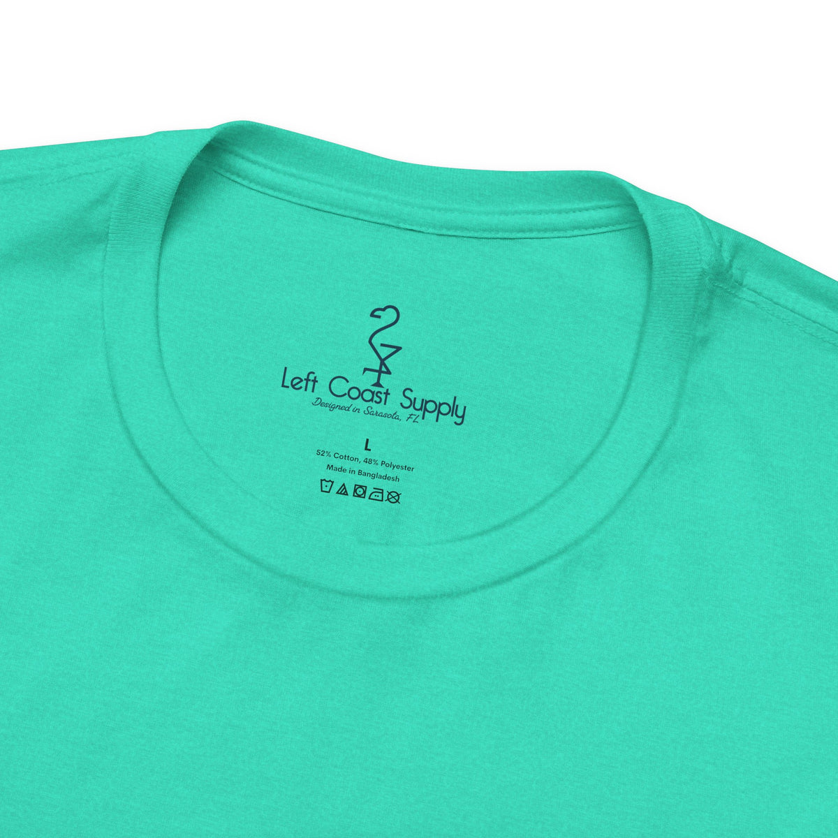 Turquoise t-shirt with a shell graphic and 'Shell Yeah!' text Left Coast Supply