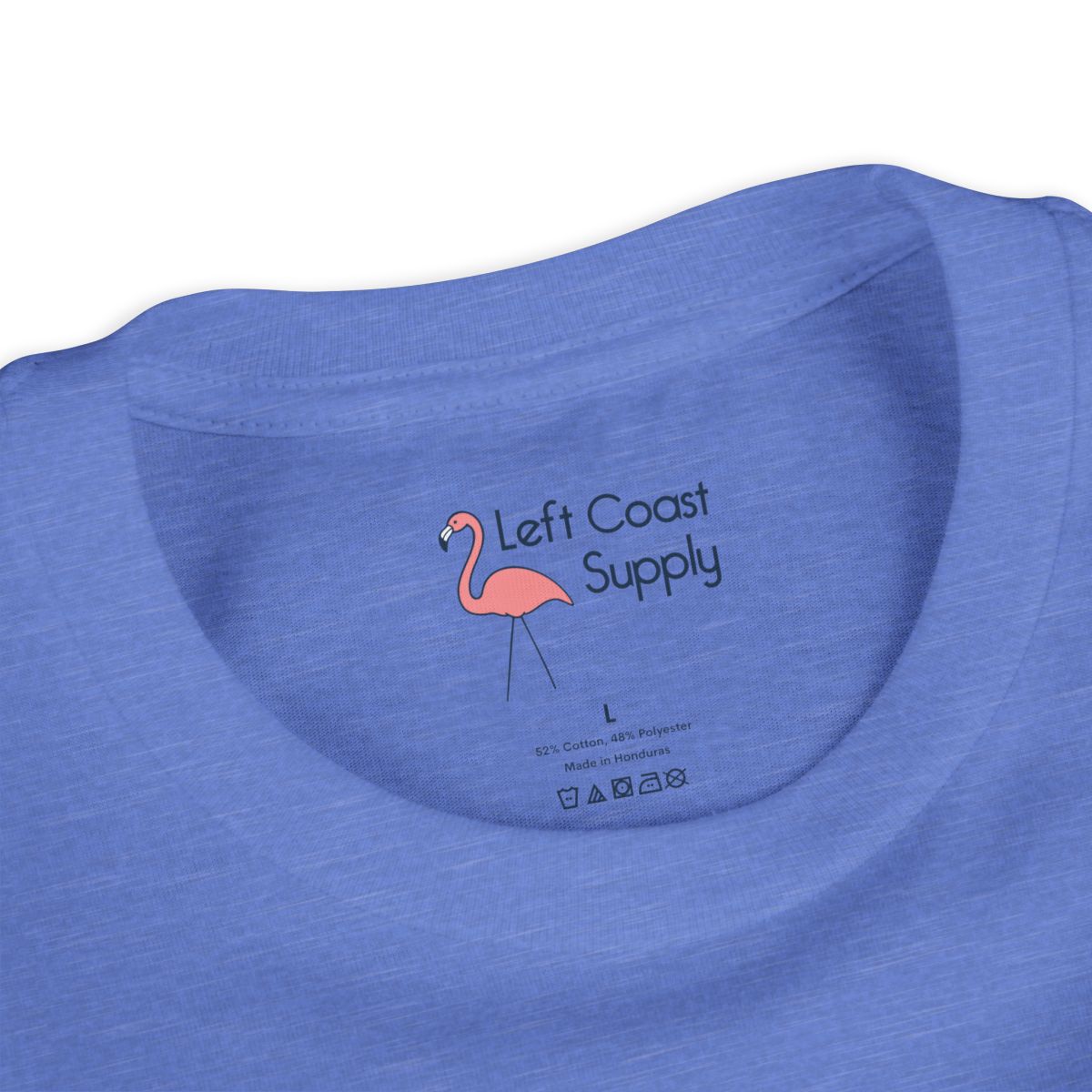 Blue kids t-shirt with a pink flamingo graphic and 'Left Coast Supply'