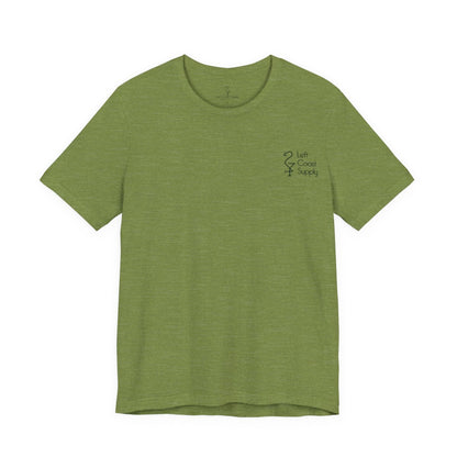 Purple t-shirt with a graphic of a monster and leaves on the back. Left Coast Supply