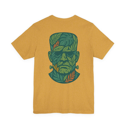 Yellow t-shirt with a leaf-patterned design on the back. Left Coast Supply